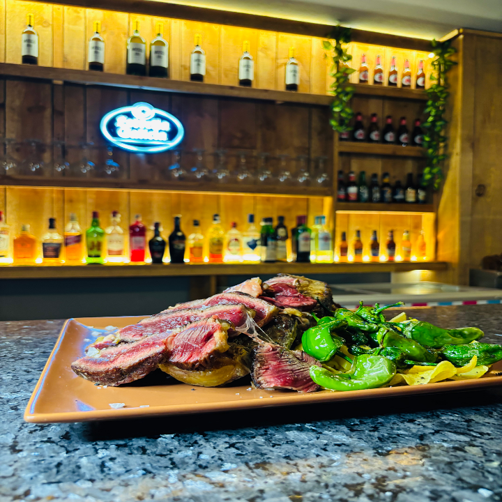 Tu Lugar Brasas y Tapas 28